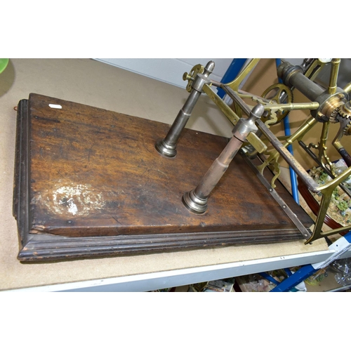 710 - A VICTORIAN BRASS YARN WINDER, the enamel recording gauge dial inscribed John Nesbit, 42 Market Stre... 