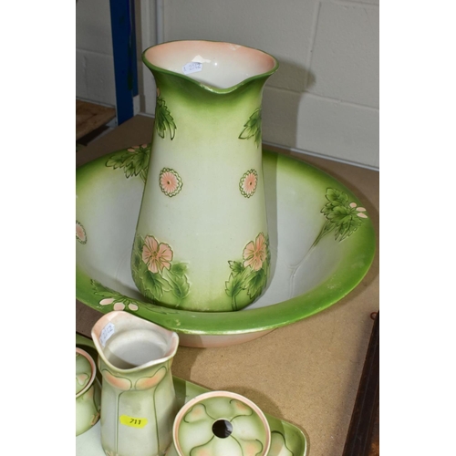 711 - A GRIMWADES POTTERY ART NOUVEAU STYLE FIVE PIECE DRESSING TABLE SET AND A SIMILAR WASH JUG AND BOWL,... 