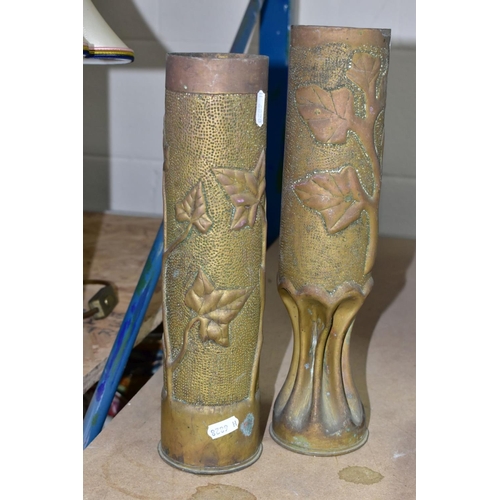 712 - TRENCH ART, four WWI brass shell cases embossed with foliate designs, one titled 'CHAMPAGNE' towards... 