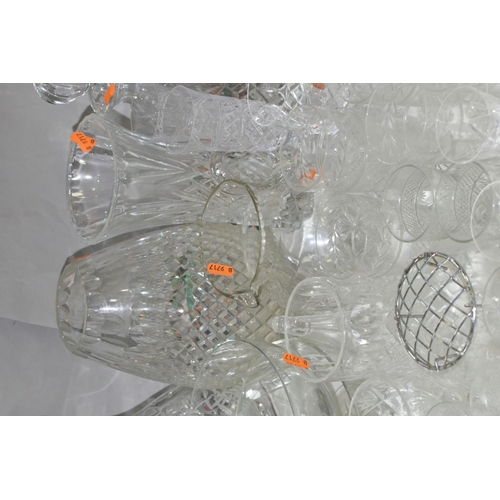 754 - A QUANTITY OF CUT CRYSTAL AND OTHER GLASSWARES, to include three decanters, three large vases talles... 