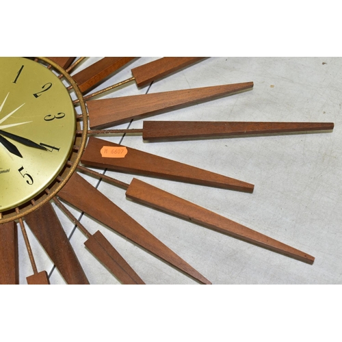 770 - A SETH THOMAS OF SCOTLAND TEAK SUNBURST WALL CLOCK, Arabic numerals, missing one of the metal and wo... 