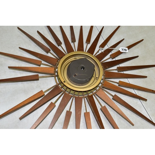 770 - A SETH THOMAS OF SCOTLAND TEAK SUNBURST WALL CLOCK, Arabic numerals, missing one of the metal and wo... 