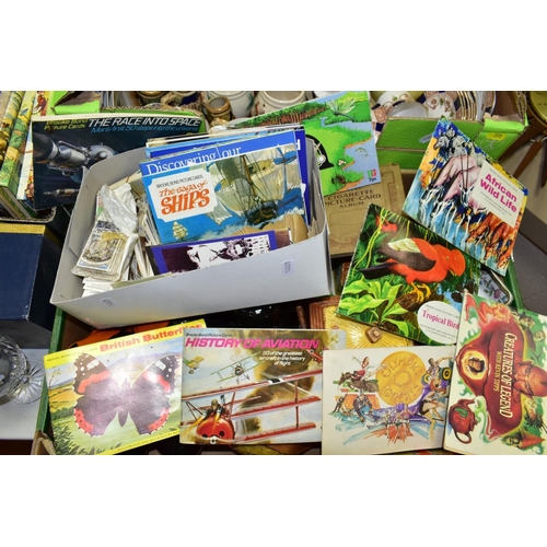 771 - FIVE BOXES AND LOOSE ASSORTED FOOTBALL CARDS, CERAMICS, GLASS, METALWARE AND SIX RUPERT ANNUALS, the... 