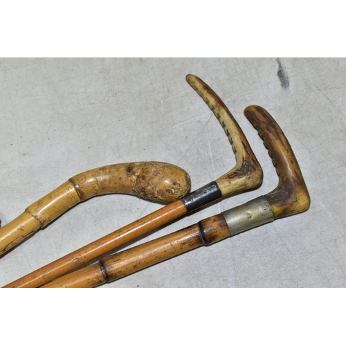 777 - THREE RIDING CROPS, comprising a crop with a silver collar hallmarked for 1946 with antler handle, a... 