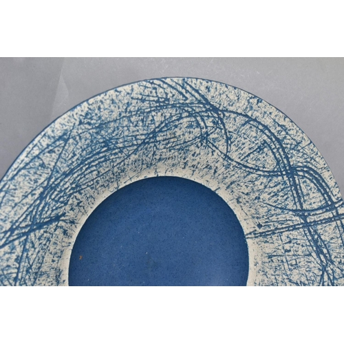 779 - LOUISE DARBY (b.1957) A STUDIO POTTERY FRUIT BOWL, with blue field, stamped to base of rim, diameter... 