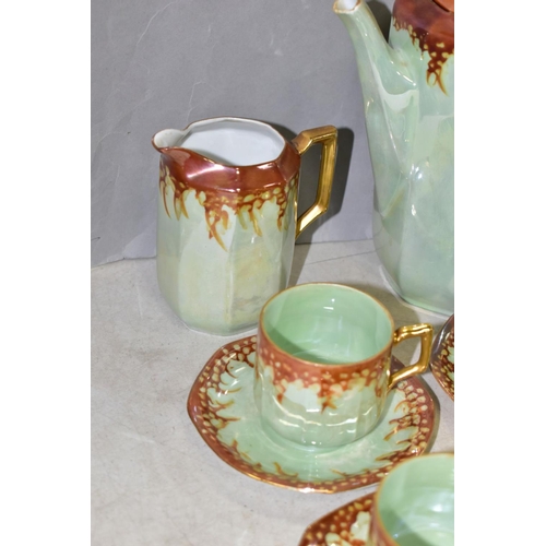 783 - A 1920S RUDOLPH WACHTER GREEN AND ORANGE LUSTRE OCTAGONAL FOURTEEN PIECE PORCELAIN COFFEE SET, compr... 