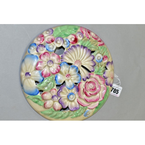 785 - A CLARICE CLIFF WILKINSON LTD CIRCULAR BOUQUET WALL PLAQUE, relief moulded with pastel colour flower... 