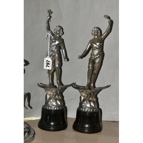 797 - A PAIR OF ART DECO CHROME FIGURES, with a pair of Art Deco chrome candle holders, the chrome figures... 