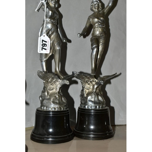 797 - A PAIR OF ART DECO CHROME FIGURES, with a pair of Art Deco chrome candle holders, the chrome figures... 