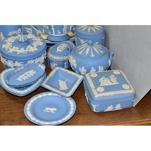 800 - A COLLECTION OF WEDGWOOD PALE BLUE JASPERWARE, nineteen pieces comprising a boxed 1981 Royal Wedding... 