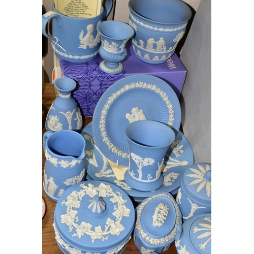 800 - A COLLECTION OF WEDGWOOD PALE BLUE JASPERWARE, nineteen pieces comprising a boxed 1981 Royal Wedding... 