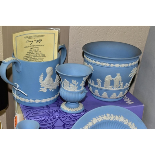 800 - A COLLECTION OF WEDGWOOD PALE BLUE JASPERWARE, nineteen pieces comprising a boxed 1981 Royal Wedding... 