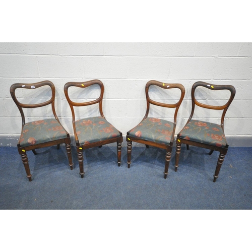 1384 - A SET OF FOUR VICTORIAN ROSEWOOD BALLOON BACK CHAIRS, with green and floral drop in seat pads, on tu... 