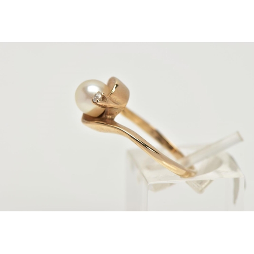 1 - A 9CT GOLD CULTURED PEARL AND DIAMOND RING, a single white cultured pearl with a cream hue, approxim... 