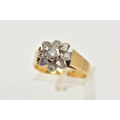 10 - A WHITE AND YELLOW METAL DIAMOND CLUSTER RING, a floral design ring in white metal set with a centra... 