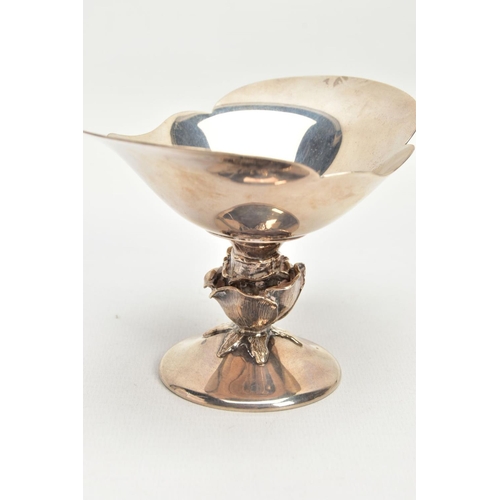 123 - A SILVER BONBON DISH, oval bonbon dish with a part scalloped rim, raised on a stem detailed as a ros... 