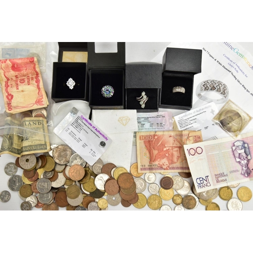 130 - FOUR RINGS AND A SMALL QUANTITY OF COINS, to include a boxed white metal cluster ring set with mysti... 