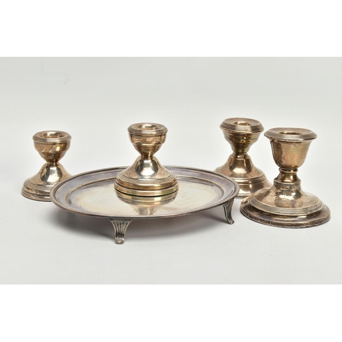 139 - A BOX OF ASSORTED SILVERWARE, to include a small silver tray with beading detail and four feet, hall... 