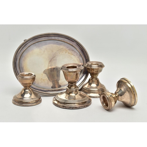 139 - A BOX OF ASSORTED SILVERWARE, to include a small silver tray with beading detail and four feet, hall... 