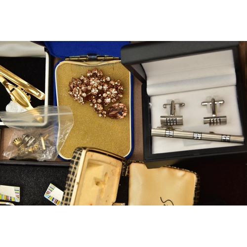 154 - A BOX OF ASSORTED ITEMS, to include various gents cufflinks and tie clips, two paste set panda brooc... 