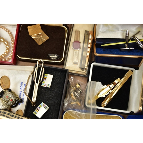 154 - A BOX OF ASSORTED ITEMS, to include various gents cufflinks and tie clips, two paste set panda brooc... 