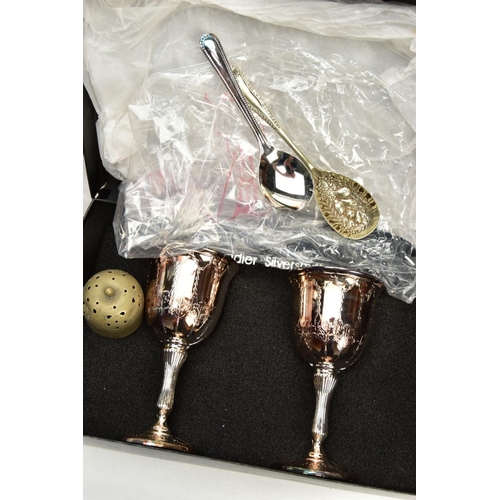 158 - TWO BOXES OF WHITE METAL WARE, to include a large quantity of collectable teaspoons, some continenta... 