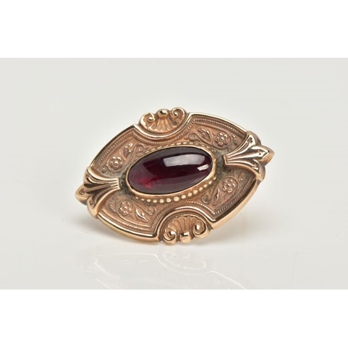 16 - A 9CT GOLD GARNET BROOCH, a rose gold Victorian style brooch, set with an elongated oval garnet, det... 