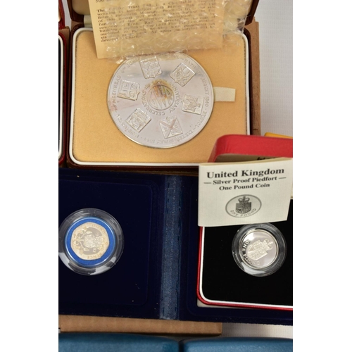 172 - A CARDBOARD BOX CONTAINING MAINLY ROYAL MINT SILVER PROOF BOXED COINS, to include a 1985 GWR 150 ann... 