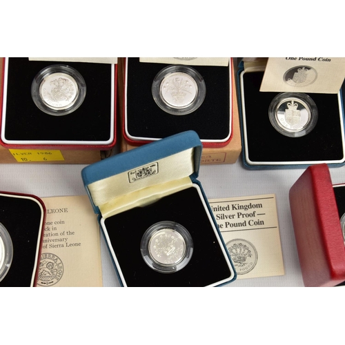 172 - A CARDBOARD BOX CONTAINING MAINLY ROYAL MINT SILVER PROOF BOXED COINS, to include a 1985 GWR 150 ann... 