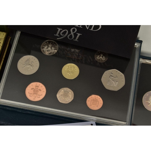 186 - A CARDBOARD BOX OF MIXED COINS AND YEAR SETS, to include five UK royal mint proof year sets 1983,198... 