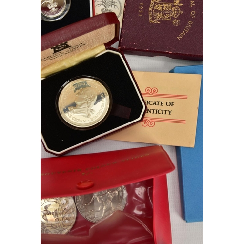 186 - A CARDBOARD BOX OF MIXED COINS AND YEAR SETS, to include five UK royal mint proof year sets 1983,198... 