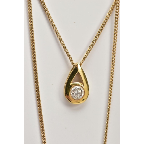 195 - A 9CT GOLD DIAMOND NECKLACE, a pear-shaped yellow gold pendant set with a round brilliant cut diamon... 