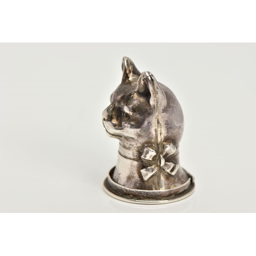 21 - A SILVER CAT VESTA CASE, designed as a cat head with a ribbon round its neck, opens to the base with... 