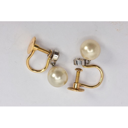 26 - A PAIR OF YELLOW METAL EARRINGS, non-pierced screw back earrings each set with an old cut diamond in... 