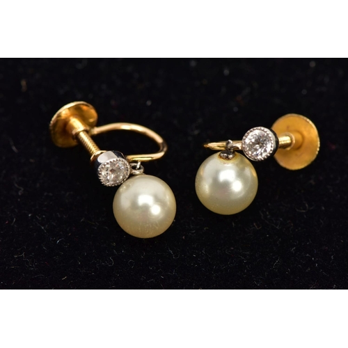 26 - A PAIR OF YELLOW METAL EARRINGS, non-pierced screw back earrings each set with an old cut diamond in... 