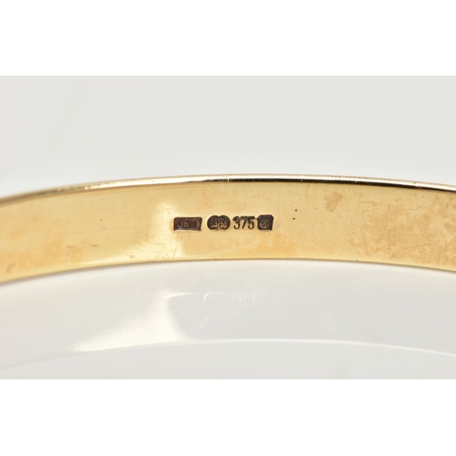 3 - A 9CT GOLD BANGLE, a plain polished solid gold bangle, approximate dimensions width 5mm x depth 2mm ... 