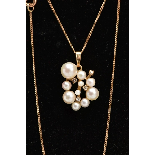 36 - A 9CT GOLD PEARL AND DIAMOND NECKLACE,  a cluster of varying sized white pearls, approximate dimensi... 