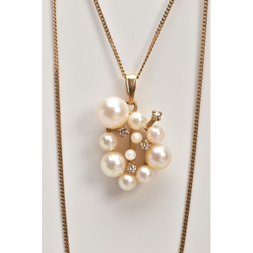 36 - A 9CT GOLD PEARL AND DIAMOND NECKLACE,  a cluster of varying sized white pearls, approximate dimensi... 