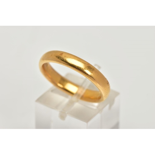 45 - A 22CT GOLD BAND RING, a plain polished courted band ring, approximate width 4mm, hallmarked 22ct Bi... 