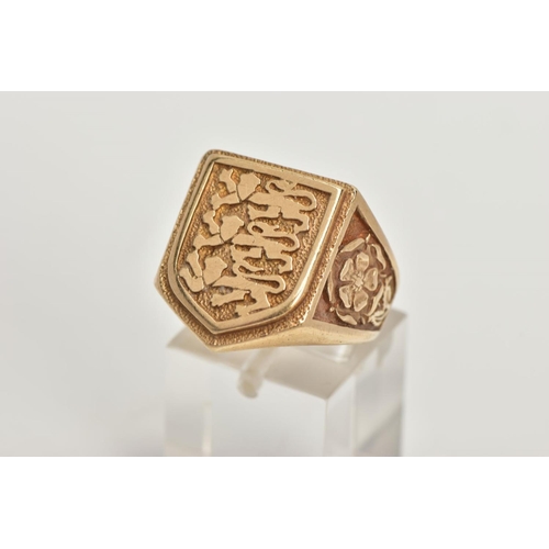 52 - A 9CT GOLD LARGE SIGNET RING, a yellow gold shield shaped signet detailing three lions, leading on t... 