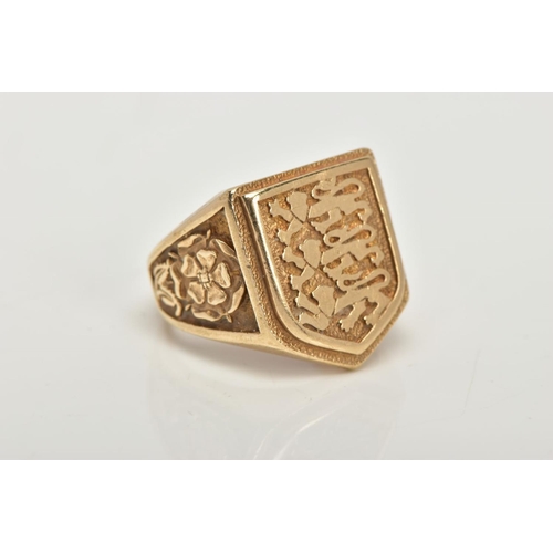 52 - A 9CT GOLD LARGE SIGNET RING, a yellow gold shield shaped signet detailing three lions, leading on t... 