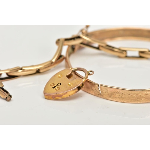 55 - A SELECTION OF YELLOW METAL, to include a heart padlock clasp, unmarked, a yellow metal stretch link... 