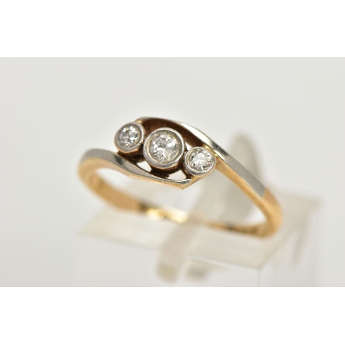 59 - A YELLOW METAL THREE STONE DIAMOND RING, three graduated old cut diamonds, milgrain bezel setting, e... 