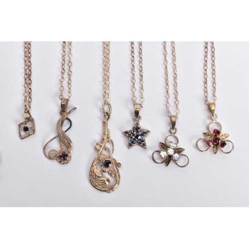 65 - A SELECTION OF WHITE METAL GEM SET NECKLACES, twelve white mental pendants suspended from white meta... 