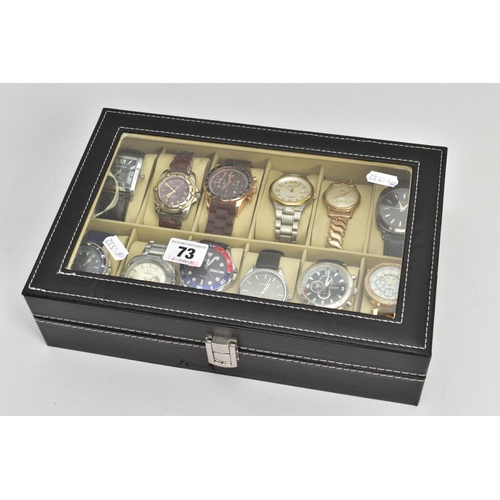 73 - A WATCH DISPLAY CASE WITH WATCHES, black faux leather case with twelve watch storage spaces and twel... 