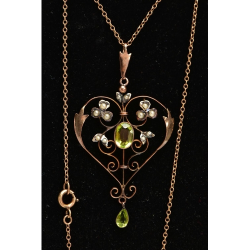 94 - AN EARLY 20TH CENTURY 9CT GOLD LAVELIER NECKLACE,  a rose gold open work heart shaped pendant, centr... 