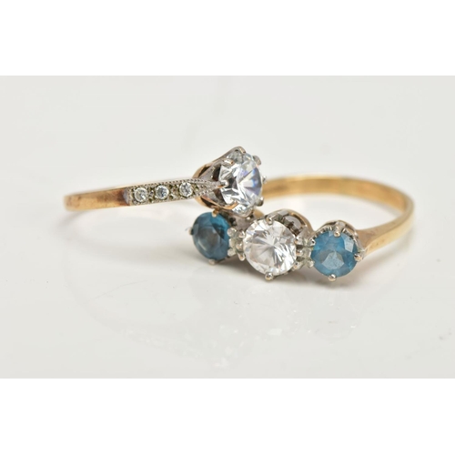 97 - TWO 9CT GOLD GEMSET RINGS, the first a three stone ring set with two circular cut blue stones, asses... 