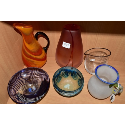 448 - SIX PIECES OF STUDIO GLASS, comprising a Gill Devine frosted glass ewer with green and yellow rim an... 