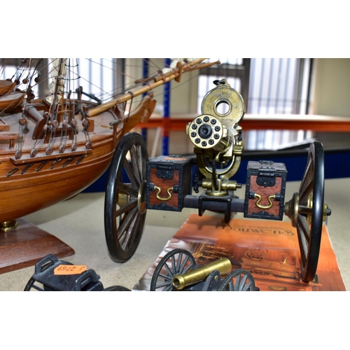 490 - A MODEL OF HMS BOUNTY AND MODEL CANNONS, a late twentieth century wooden model ship by Maquettes P. ... 