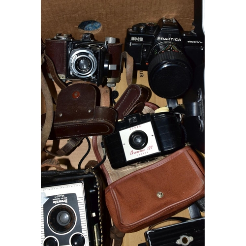 504 - A BOX OF CAMERAS AND PHOTOGRAPHIC EQUIPMENT, to include a Cosina CSM 35mm camera fitted with a Cosin... 